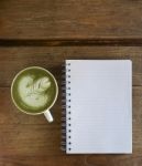 Green Tea Later With Blank Note Book Stock Photo
