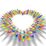 Colorful People In Heart Shape Stock Photo