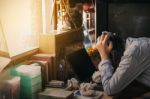 Girl Was Stressed On The Table Stock Photo