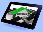Mortgage House Tablet Means Debt And Repayments On Property Stock Photo