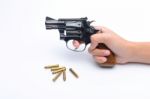 Woman's Hand With A Gun Isolated On White Background Stock Photo