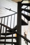 Dark Iron Metal Spiral Staircase Stock Photo