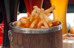 Fresh French Fries On A Bucket Stock Photo