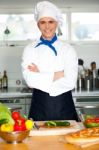 Male Chef Chopping Vegetables In Table Stock Photo
