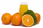 Bunch Of Oranges With Juice Stock Photo