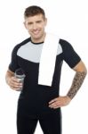 Energetic Fit Man Holding Water Bottle Stock Photo