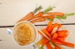 Fresh Hummus Dip With Raw Carrot And Celery Stock Photo