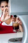 Girl Filling Glass With Chocolate Shake Stock Photo