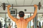Men's Fitness Weight Training In The Gym Stock Photo