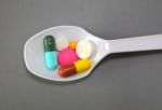 Spoonful Of Pills  Stock Photo