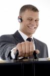 Businessman giving his Briefcase Stock Photo
