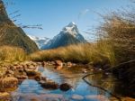 Mountains Reflecting In A River Stock Photo
