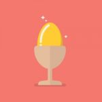 Golden Egg In Eggcup Stock Photo