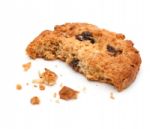 Close Up Of An Half Eaten Cookie With Crumb Stock Photo