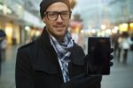 Urban Man Holdin Tablet Computer On Street Stock Photo