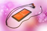 Multimedia Smart Phone With Earphones Stock Photo