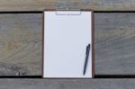 Clipboard And Blank White Paper Stock Photo