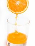 Squeezed Fresh Orange Shows Citrus Fruit And Beverages Stock Photo