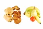 Healthy Vs Unhealthy (baked Goods And Fruits On White) Stock Photo