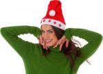 Happy Young Woman Wearing Santa Hat Stock Photo