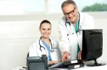 Two Cheerful Doctors At Hospital Stock Photo