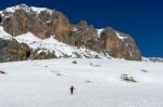 Person Skiing In The Dolomites From The Pordoi Pass Stock Photo