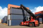 Crane Lifting Up Container In Railroad Yard Stock Photo