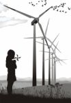 Girl And Wind Turbine Stock Photo