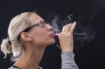 Woman Smoking E-cigarettete Stock Photo