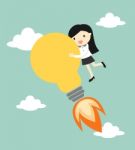 Business Concept, Business Woman Holding Big Bulb Light With Start Up Concept Stock Photo