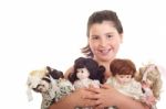 Little Girl With Dolls Stock Photo