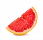 Slice Of Grapefruit Isolated On The White Background Stock Photo