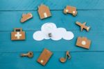 Cardboard Web Icons  And White Cloud And A Light Bulb Stock Photo