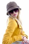 Lady Wearing Cap And Sunglasses Stock Photo