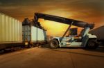 Crane Lifts A Container Stock Photo