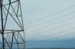 High Voltage Power Lines During A Storm Stock Photo