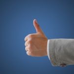Business Man Show Thumb Up Stock Photo