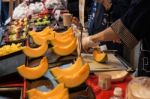Cutting Japanese Melon Stock Photo