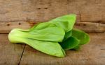 Bok Choy Vegetable On The Wooden Background Stock Photo