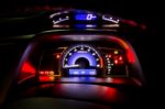 Modern Car Instrument Dashboard Panel And Digital Speed Meter In Night Time Stock Photo