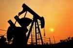 Pumpjack Pumping Crude Oil From Oil Well Stock Photo