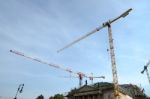 Multitude Of Cranes Above St. Hedwig's Cathedral In Berlin Stock Photo