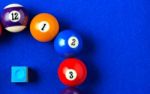 Billiard Balls In A Blue Pool Table Stock Photo