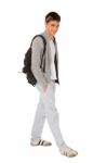 Teenage Boy Carrying Rucksack Stock Photo