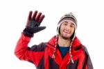 Young man with waving hand Stock Photo