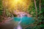 Thailand Waterfall With Sunbeam In Kanjanaburi (erawan Waterfall) Stock Photo