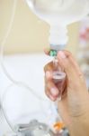 Close Up Saline Iv Drip For Patient And Infusion Pump In Hospita Stock Photo