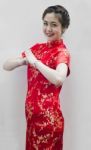 Happy Chinese New Year. Beautiful Asian Woman With Gesture Of Co Stock Photo