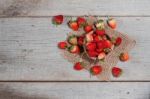 Strawberries On The Old Wooden Stock Photo