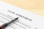 Lease Agreement Contract Document And Pen Bottom Left Corner Stock Photo